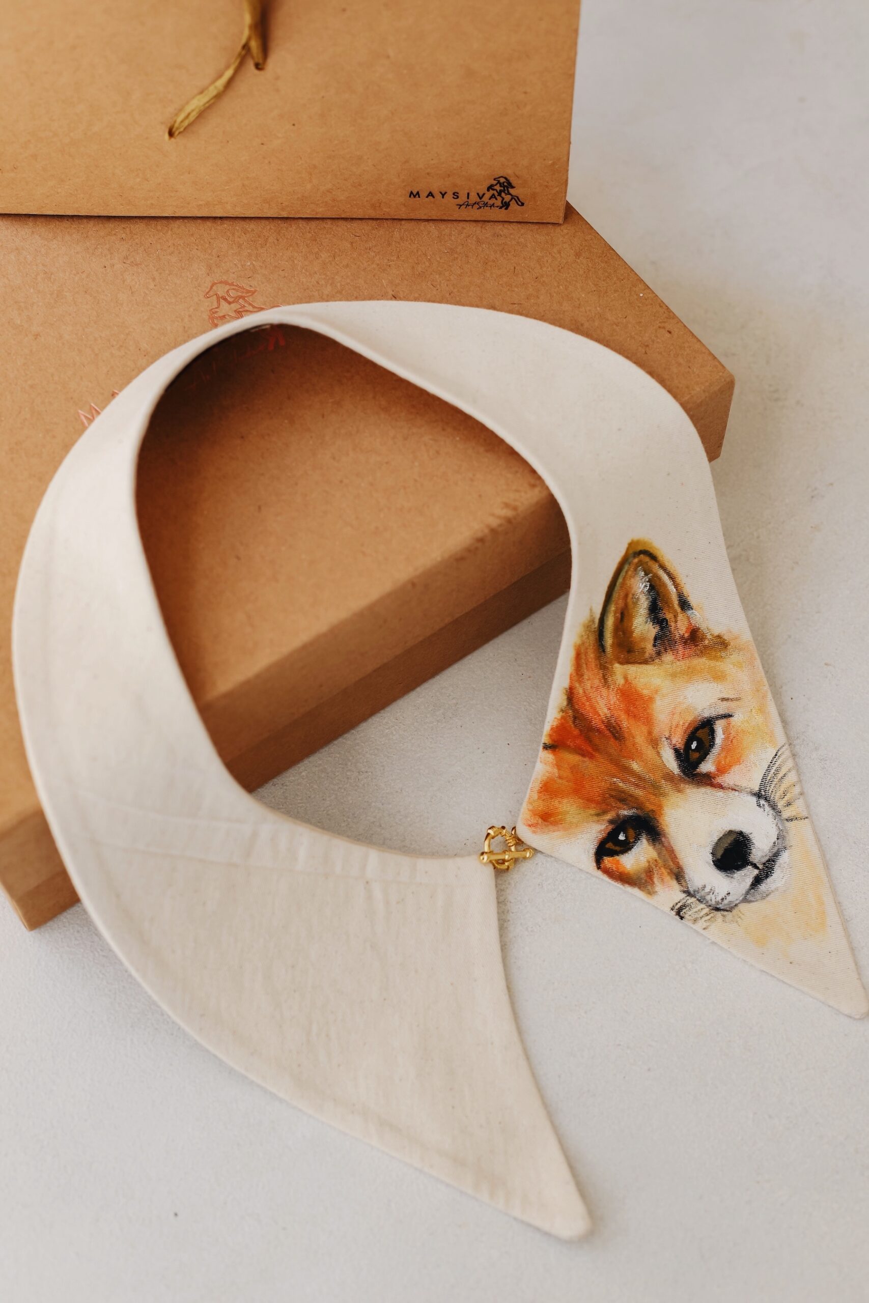 Baby V collar designed by painting artist. It is an art accessory with animal figure pattern organic cotton