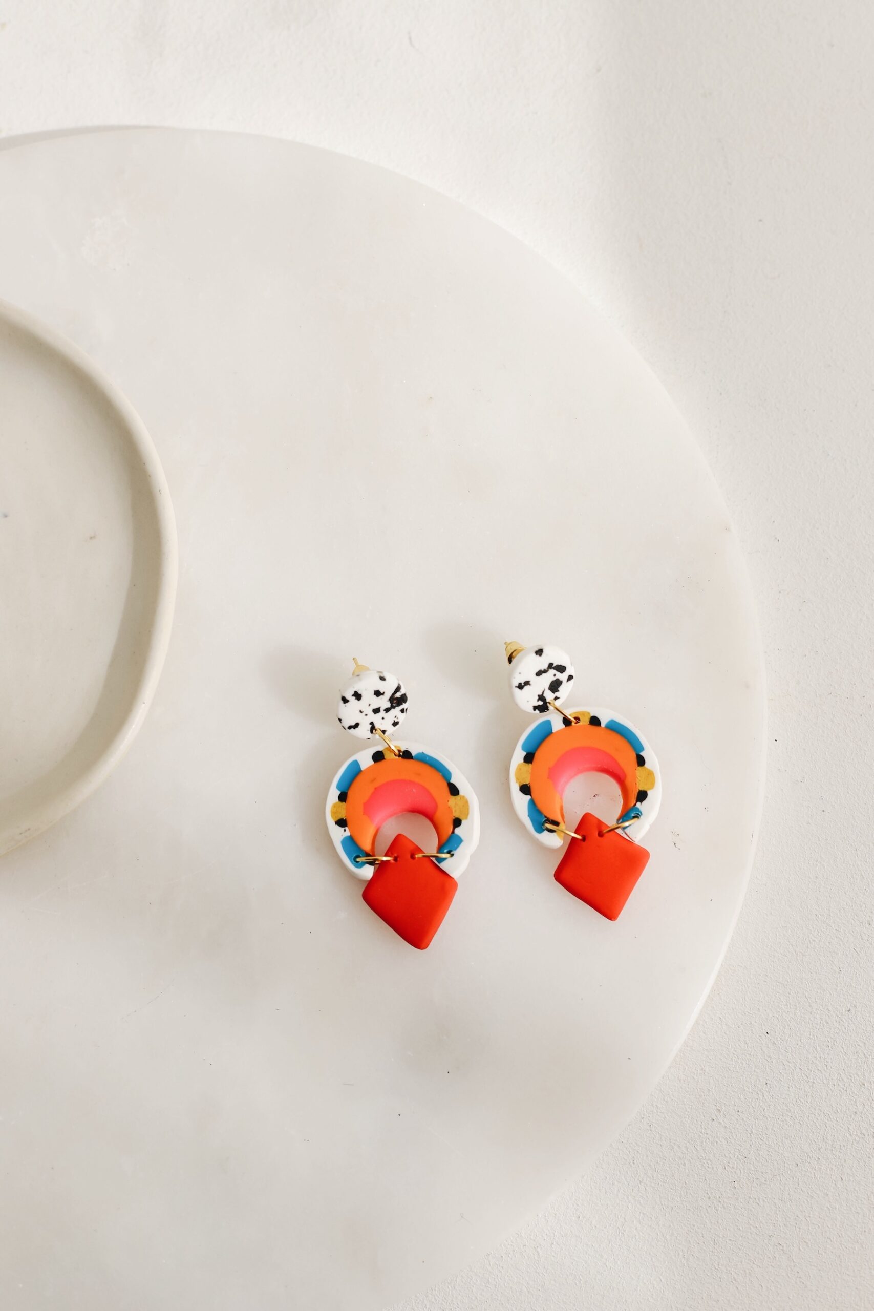 Ada is an earring was designed by a handmade woman designer. It was made of clay