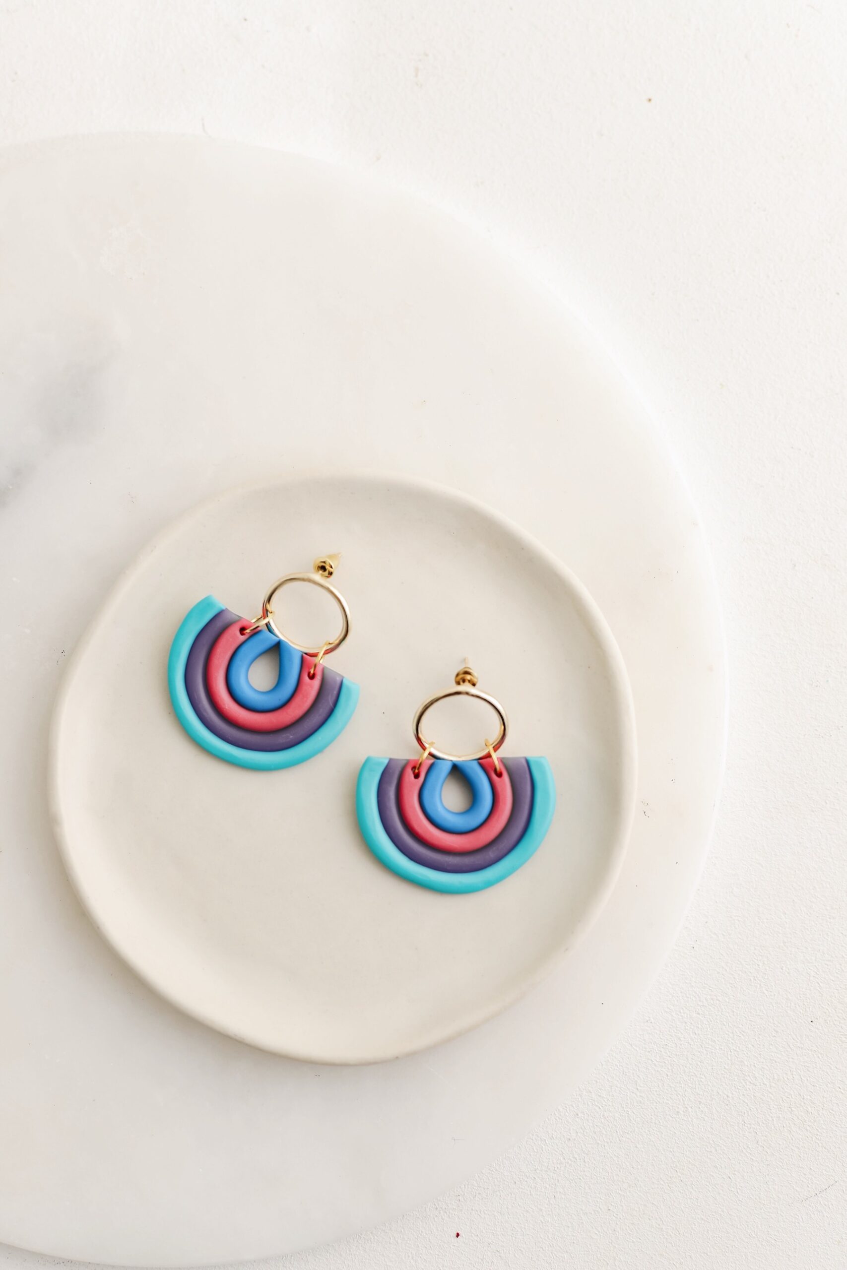 Anne is an earring was designed by a handmade woman designer. It was made of clay.