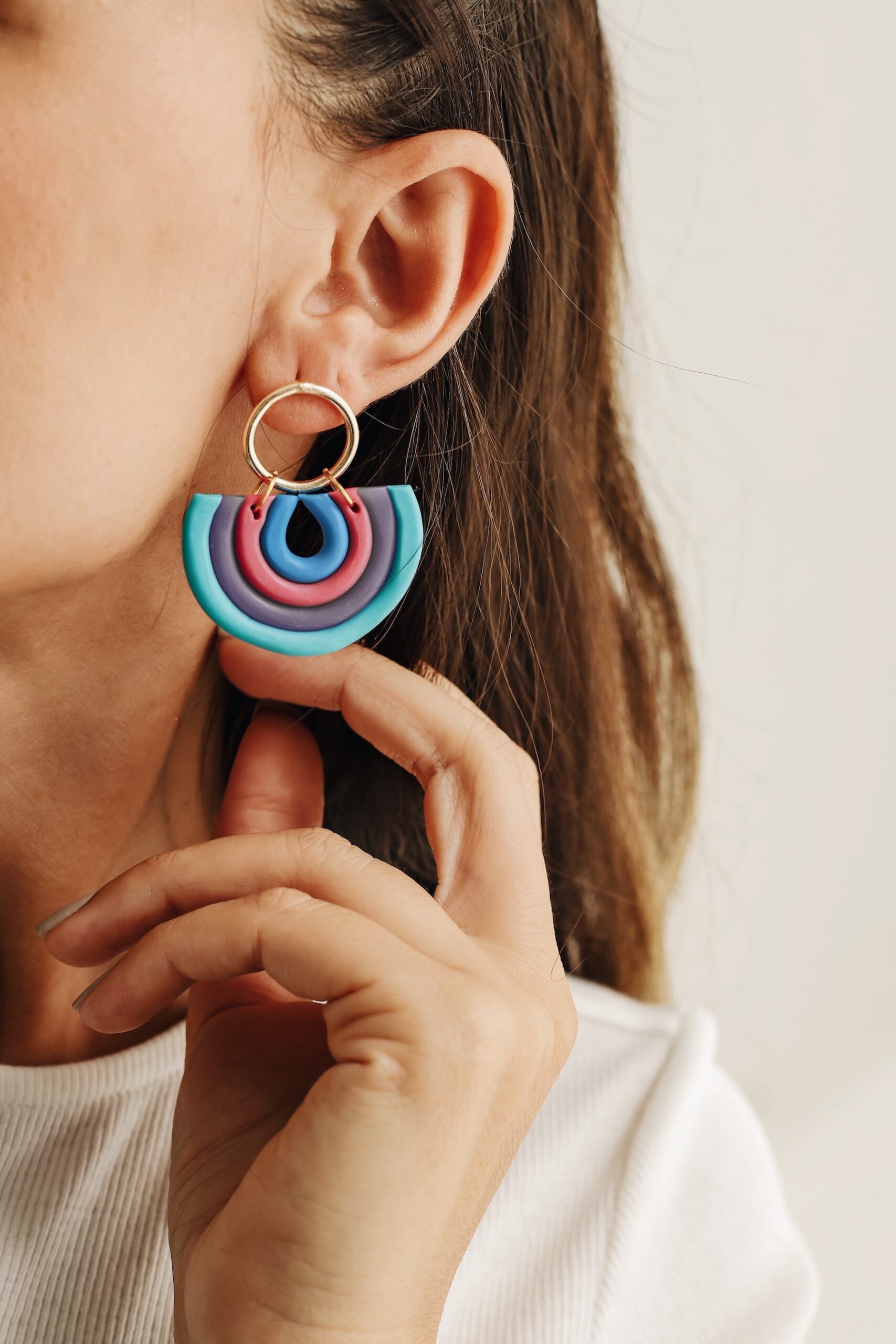 Anne is an earring was designed by a handmade woman designer. It was made of clay